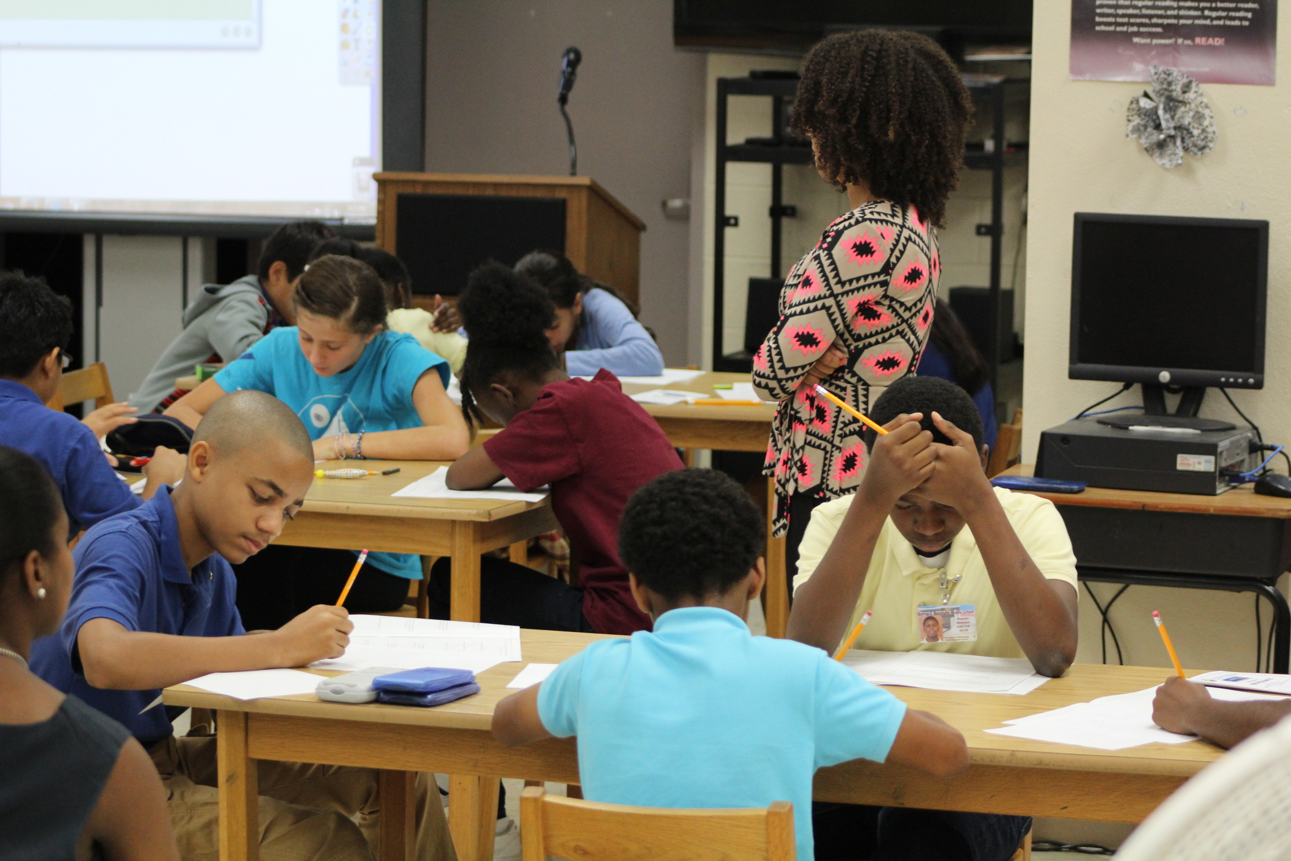 Students work through their MATHCOUNTS booklet in the Sprint round.jpg